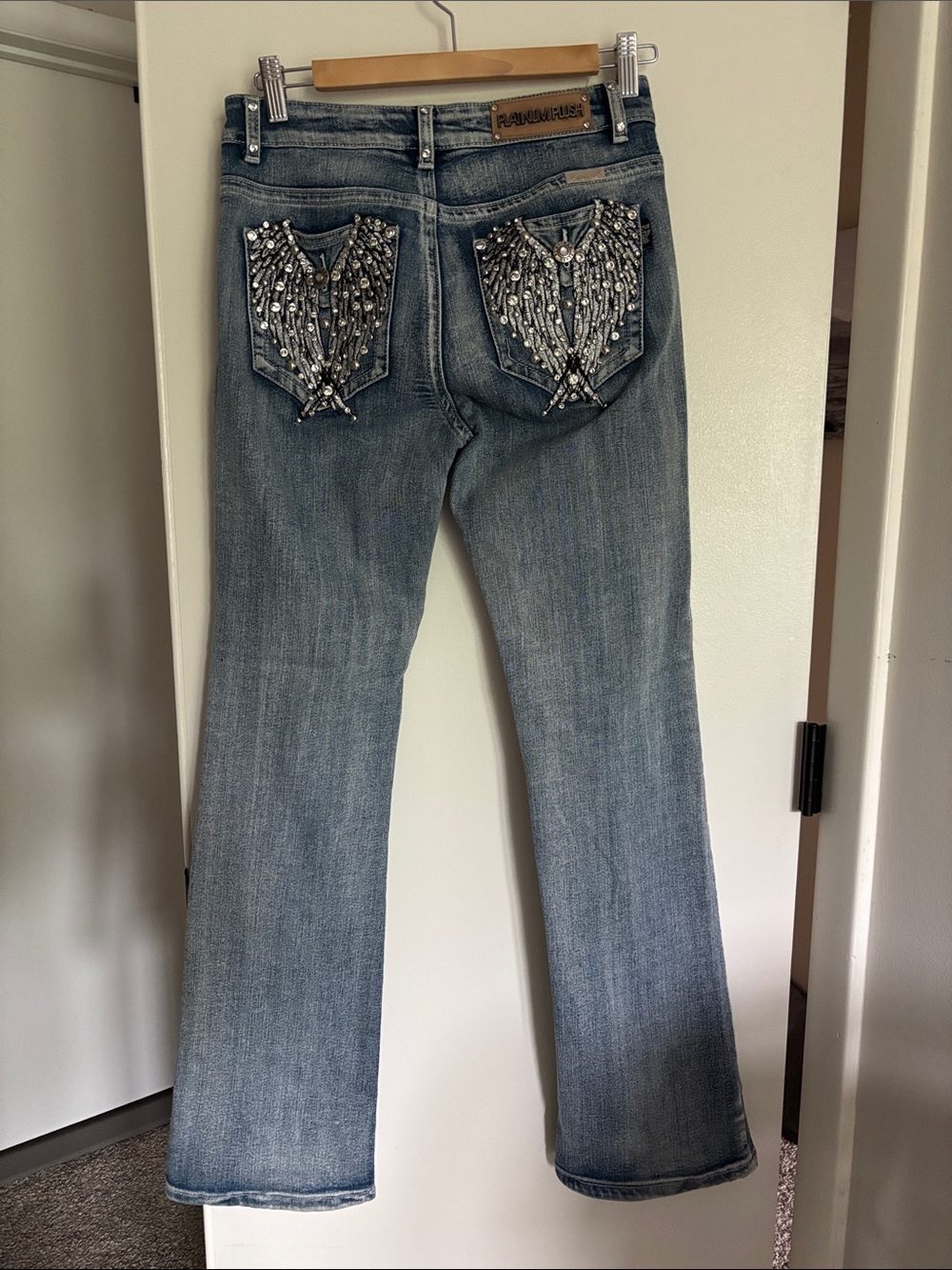 Embellished Light Blue Wide-Leg Jeans with Beaded Back Pockets